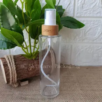 Търговия на едро с празни козметични спрейове с логото на поръчка, буркан с капак от бамбуково дърво, прозрачни стъклени бутилки за опаковане на продукти за грижа за кожата
